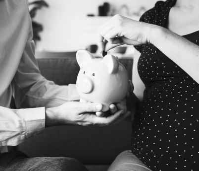 person holding piggy bank